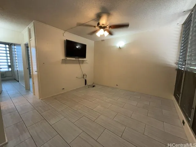 a view of a livingroom with a flat screen tv
