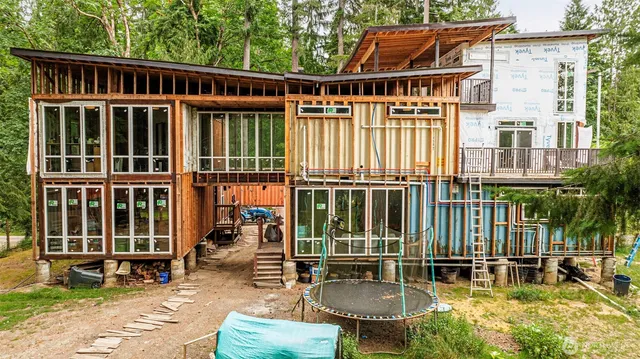 a view of a chair and table in the patio