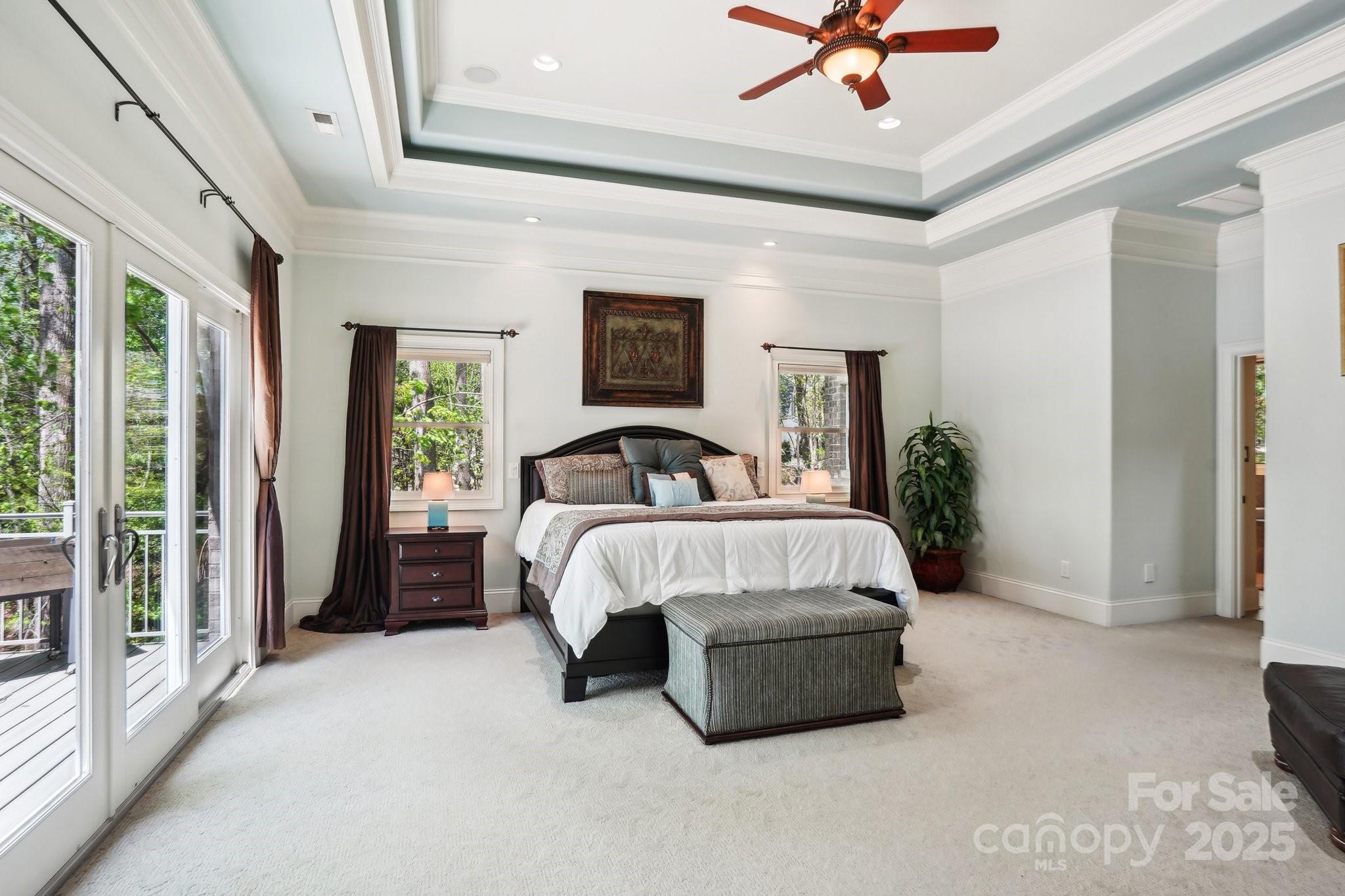 167 Maple View Drive Troutman, NC 28166 - Photo 17 of 48 a bedroom with a bed lamp and window