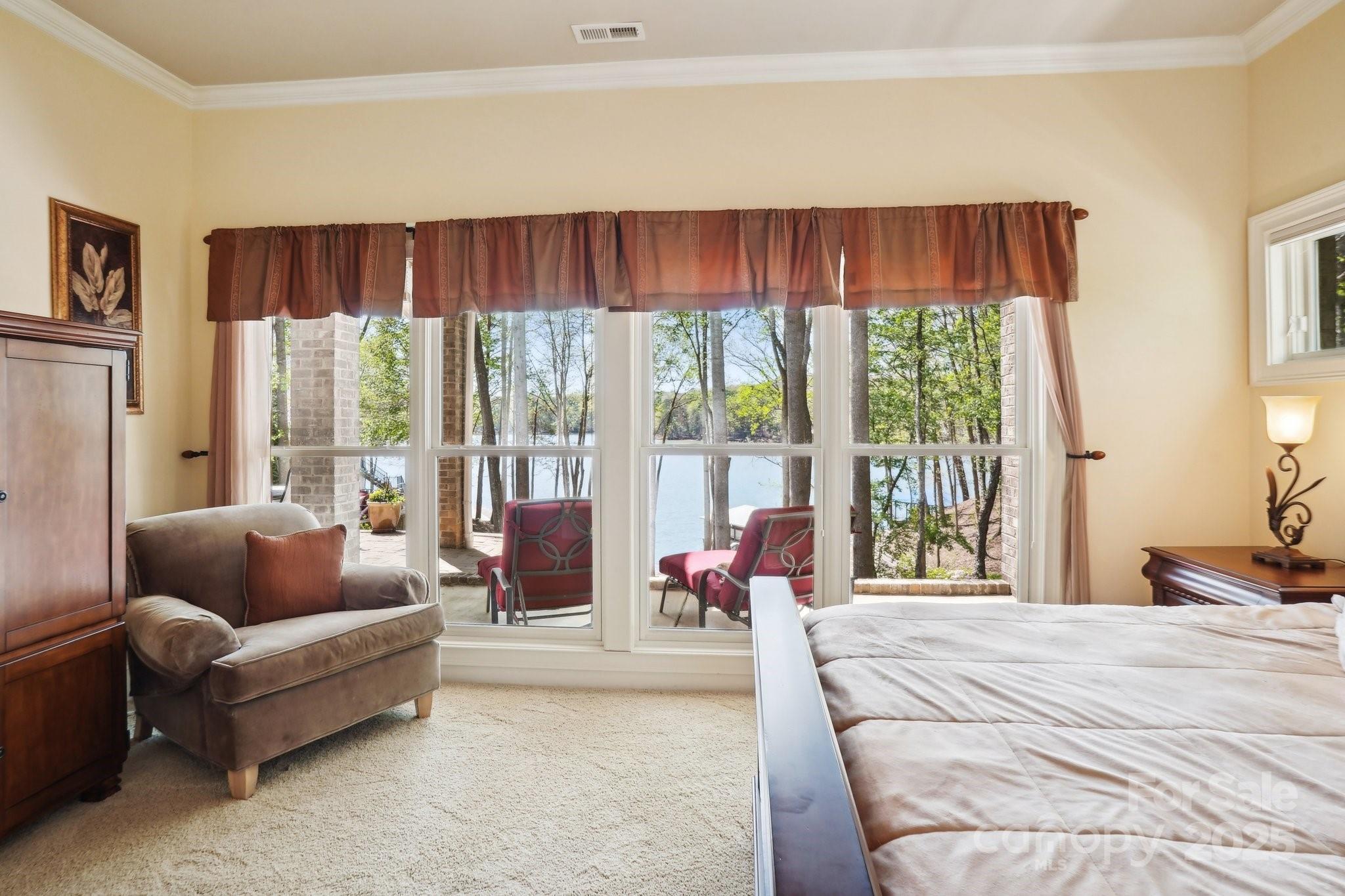 167 Maple View Drive Troutman, NC 28166 - Photo 29 of 48 a living room with furniture and a large window