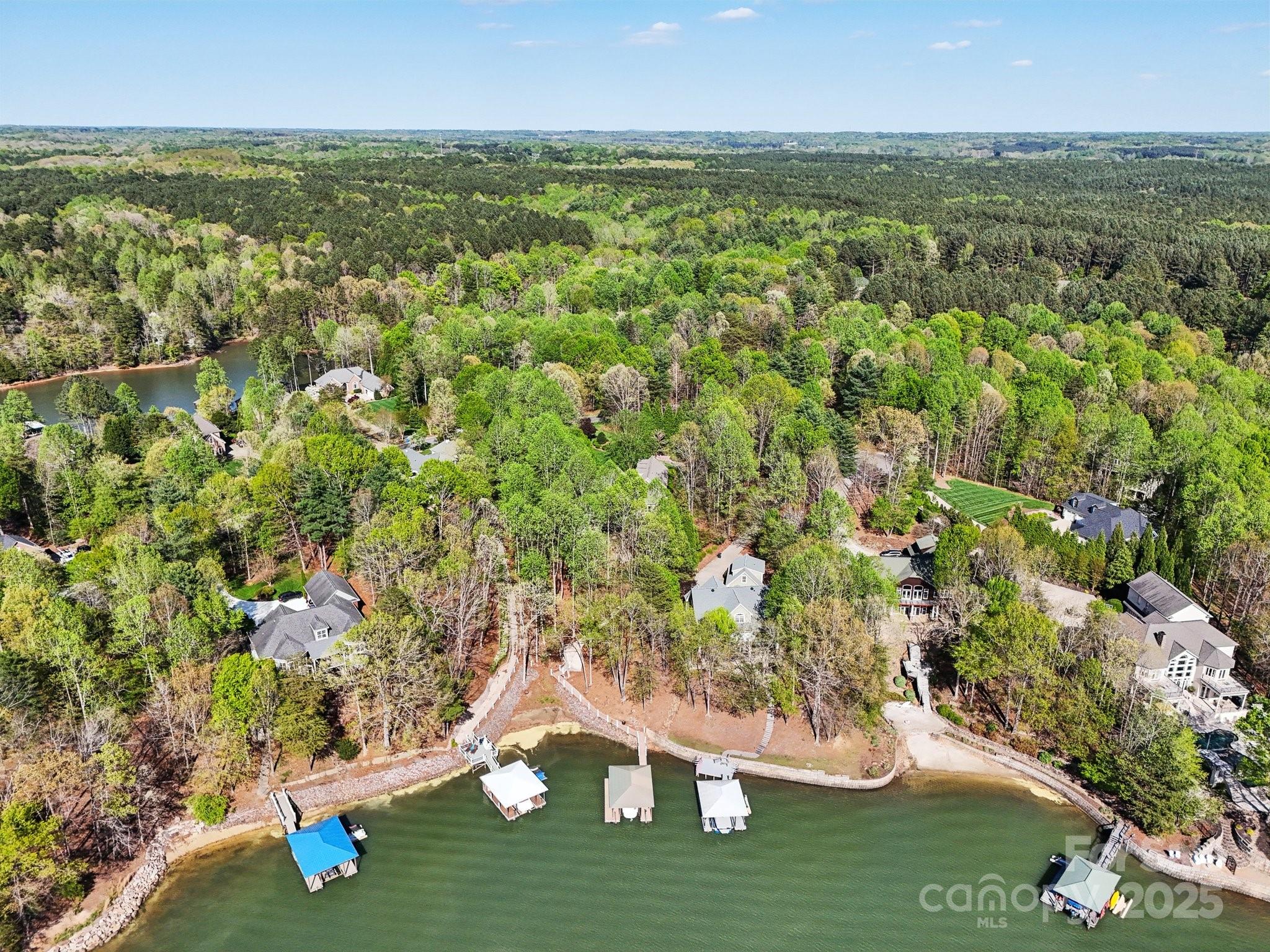 167 Maple View Drive Troutman, NC 28166 - Photo 39 of 48 an aerial view of residential houses with outdoor space and trees