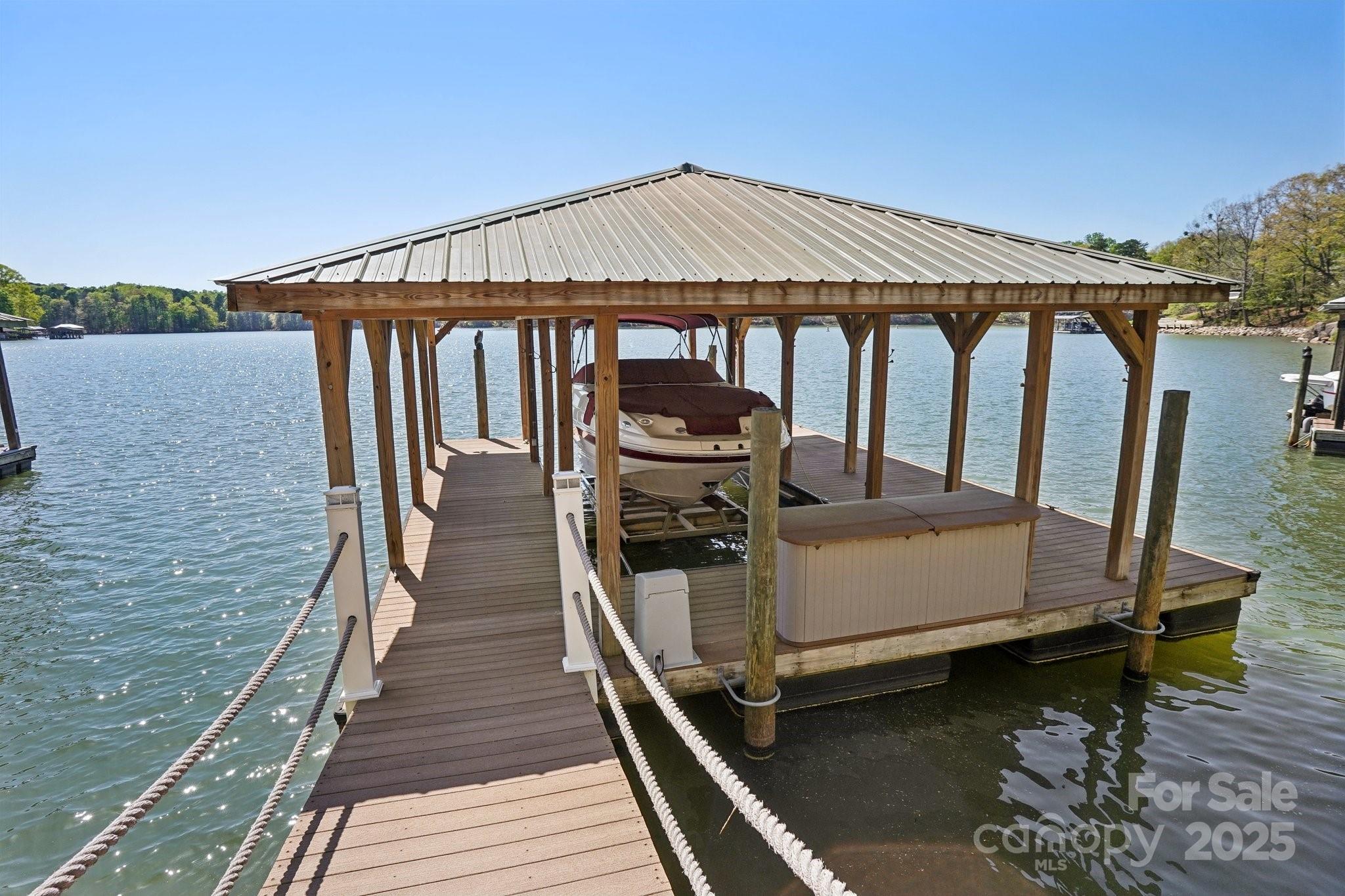 167 Maple View Drive Troutman, NC 28166 - Photo 42 of 48 a view of a balcony with chairs and wooden floor