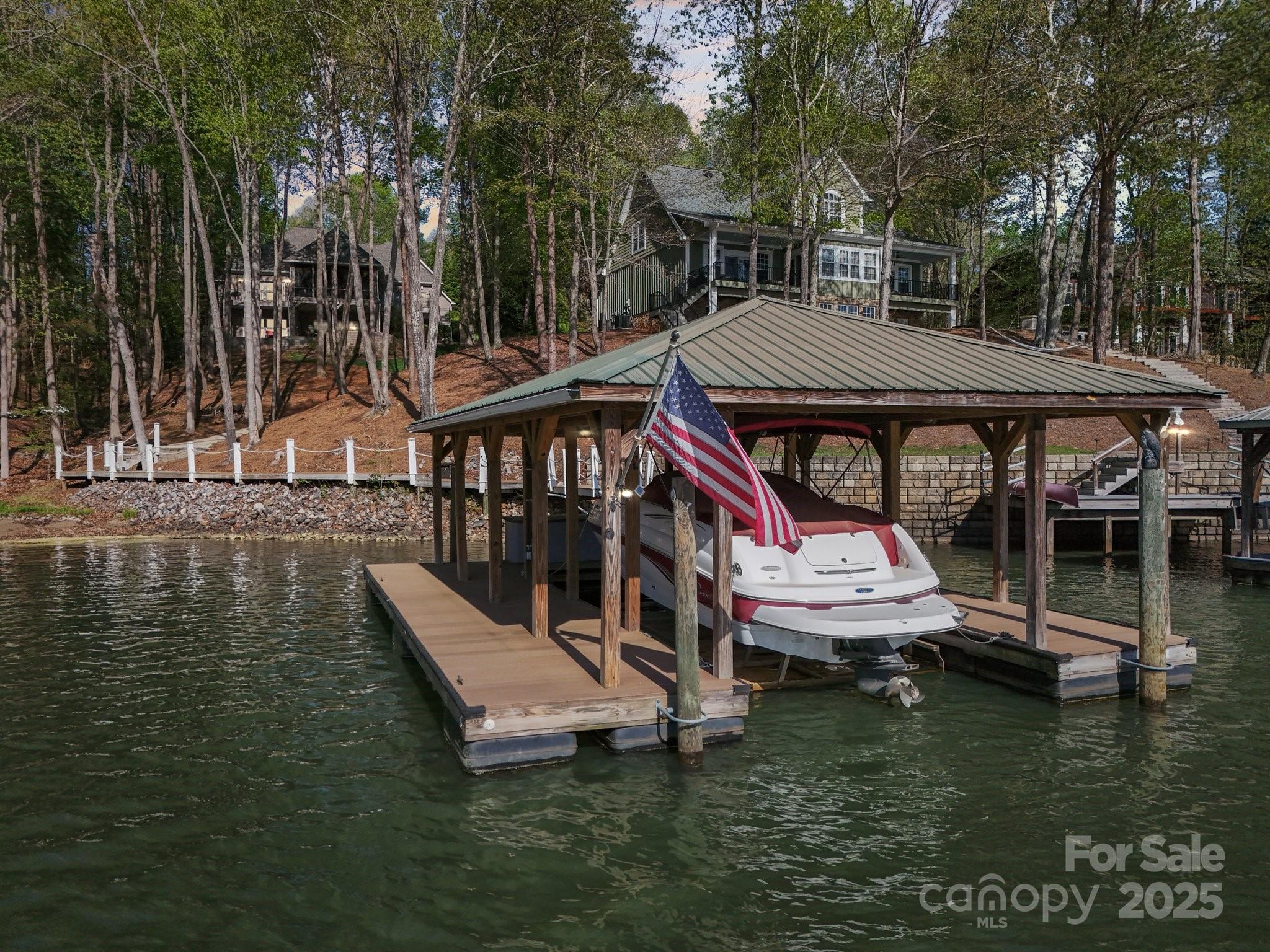 167 Maple View Drive Troutman, NC 28166 - Photo 44 of 48 a small pool with lawn chairs under an umbrella