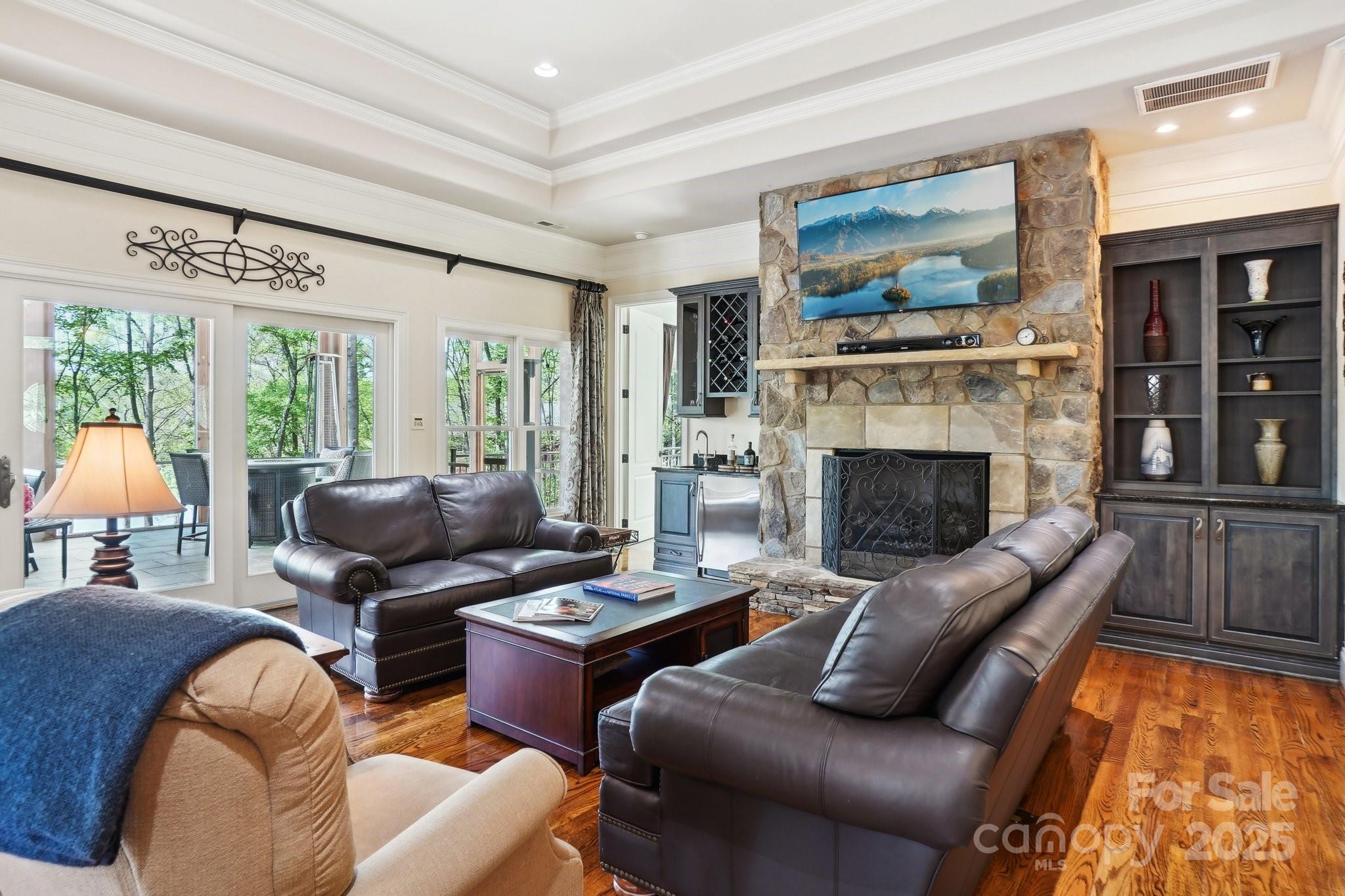 167 Maple View Drive Troutman, NC 28166 - Photo 8 of 48 a living room with furniture fireplace and flat screen tv