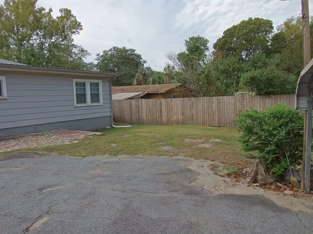 a view of backyard with green space