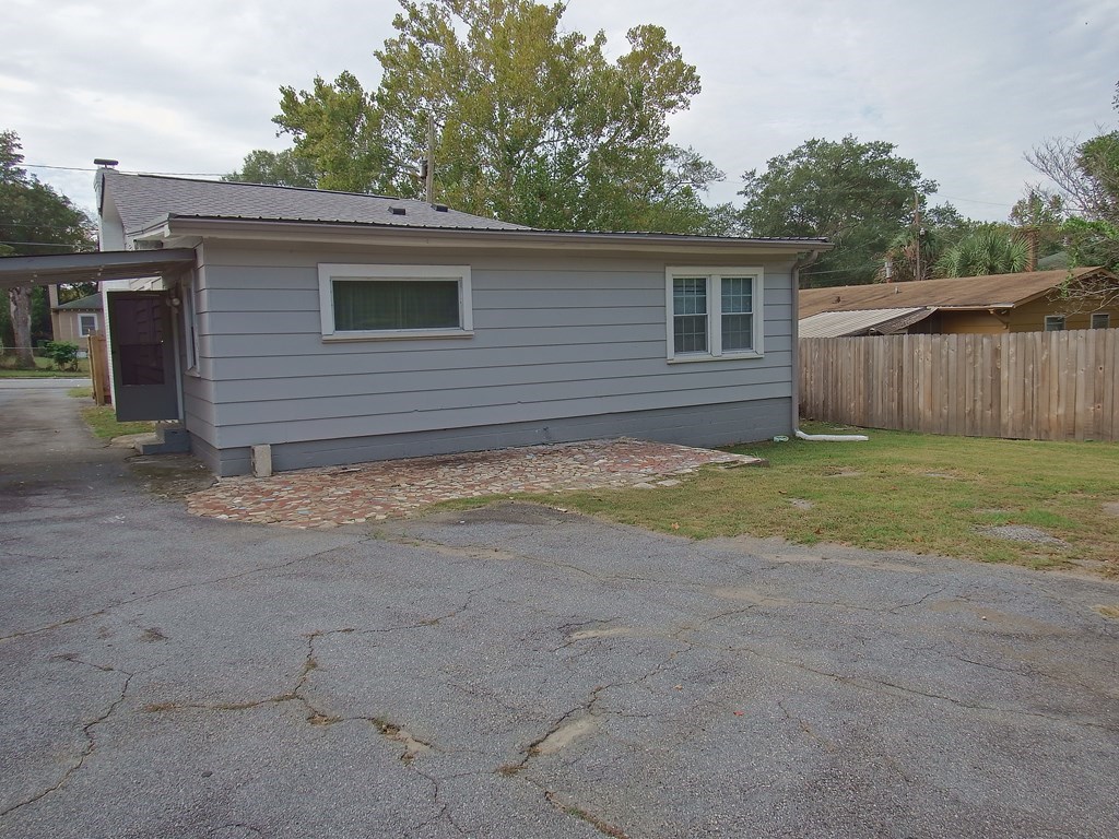 2211 Tillman Street Columbus, GA 31906 - Photo 6 of 20 a view of a house with a yard