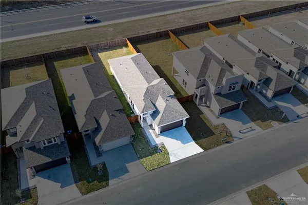 a view of living room with furniture and a floor to ceiling window