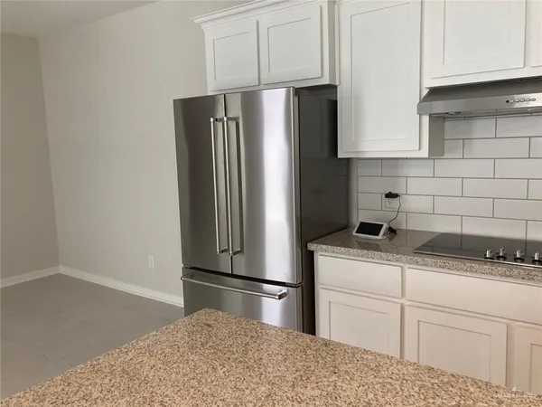 a view of a room with an empty space