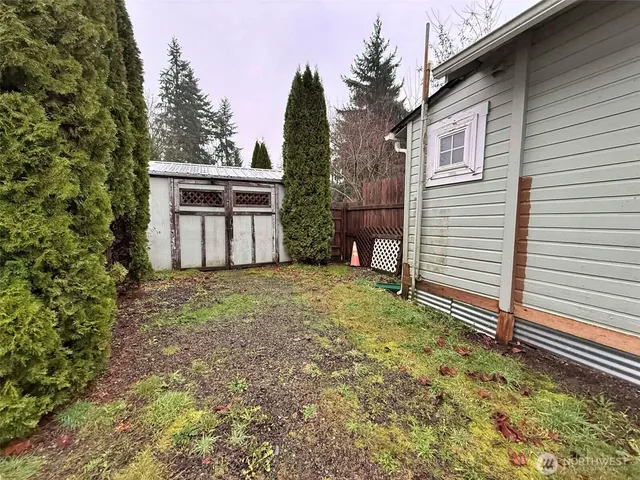 a house with trees in front of it