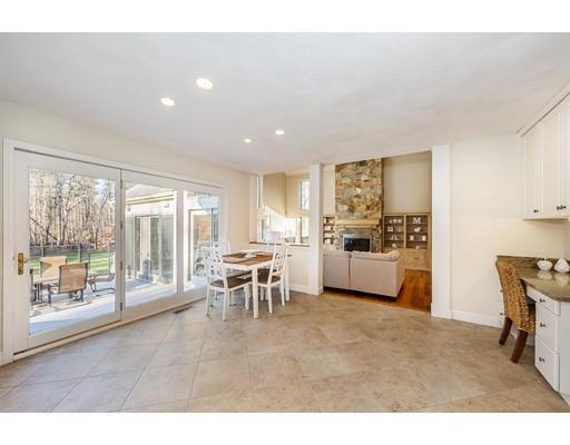 51 Townsend Farm Road Boxford, MA 01921 - Photo 11 of 30 a living room with furniture a large window and stainless steel appliances