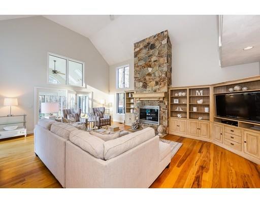 51 Townsend Farm Road Boxford, MA 01921 - Photo 12 of 30 a living room with fireplace furniture and a flat screen tv