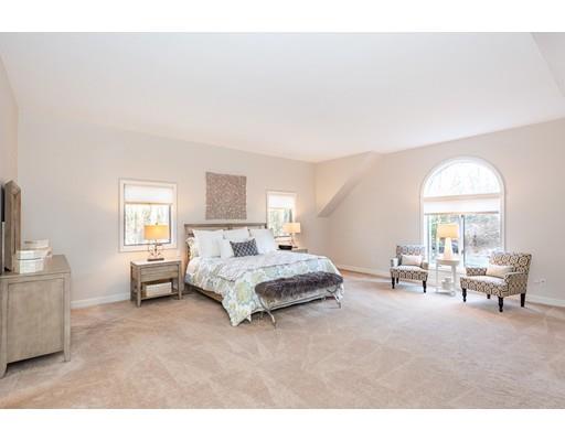 51 Townsend Farm Road Boxford, MA 01921 - Photo 21 of 30 a spacious bedroom with a bed and a couch