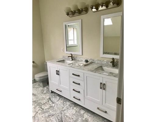 51 Townsend Farm Road Boxford, MA 01921 - Photo 24 of 30 a bathroom with a sink a vanity and a mirror