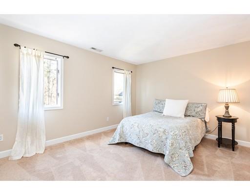 51 Townsend Farm Road Boxford, MA 01921 - Photo 26 of 30 a bedroom with a bed and a night stand
