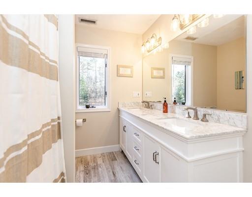 51 Townsend Farm Road Boxford, MA 01921 - Photo 28 of 30 a bathroom with a sink vanity granite and a mirror