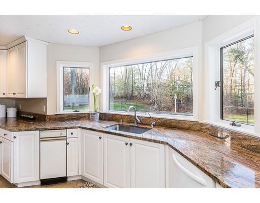 51 Townsend Farm Road Boxford, MA 01921 - Photo 10 of 30 a kitchen with granite countertop a sink and a white wooden cabinets