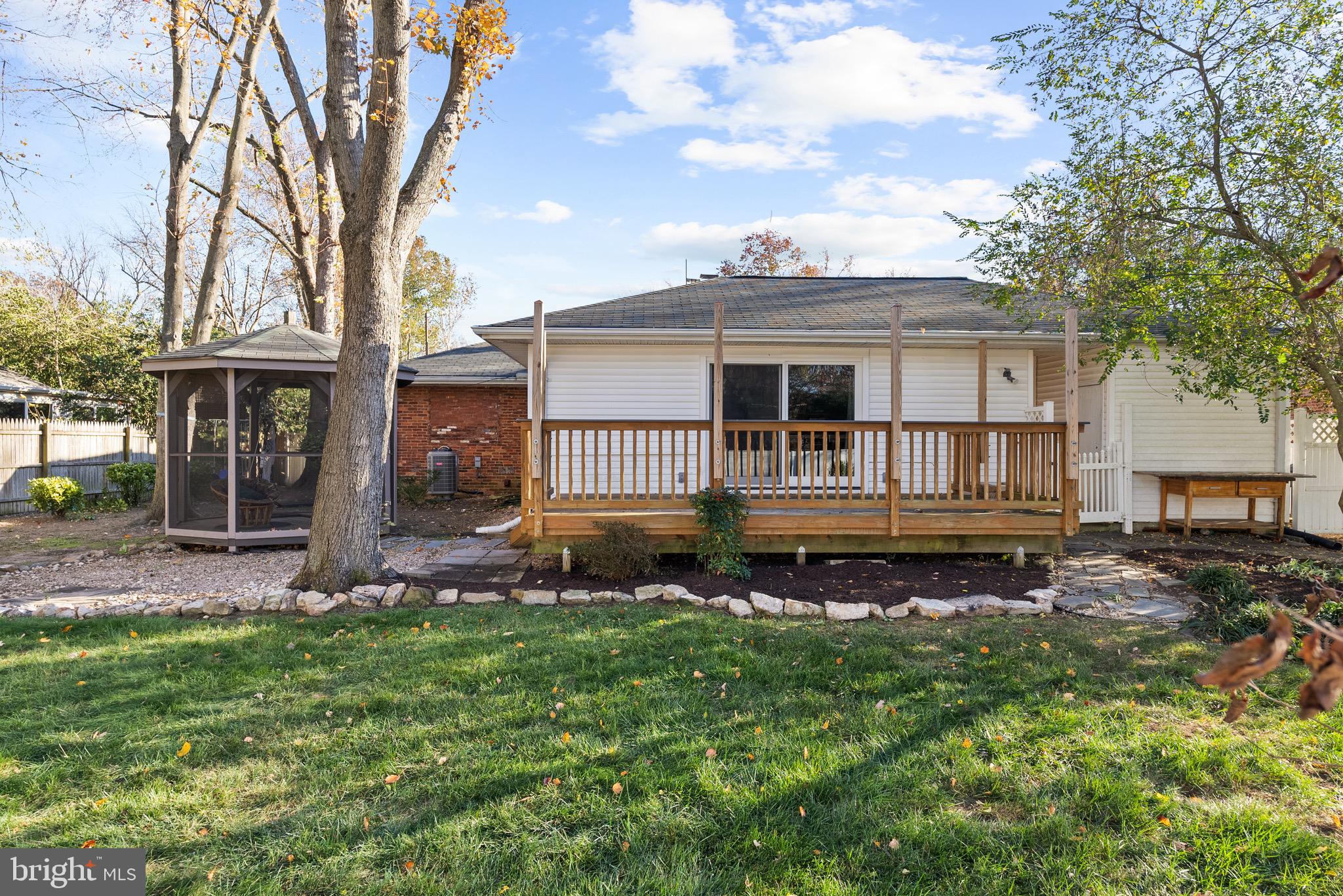 2002 Shenandoah Road Alexandria, VA 22308 - Photo 20 of 20 a view of a house with a yard and a large tree