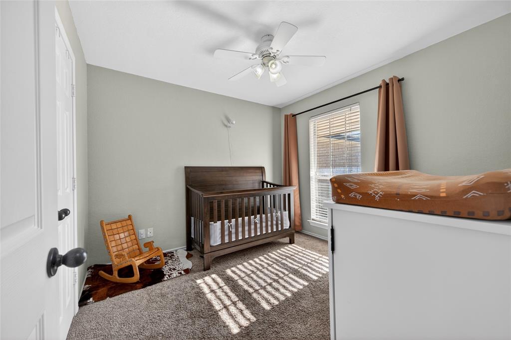 420 Robert Drive Springtown, TX 76082 - Photo 18 of 38 a bedroom with furniture and window