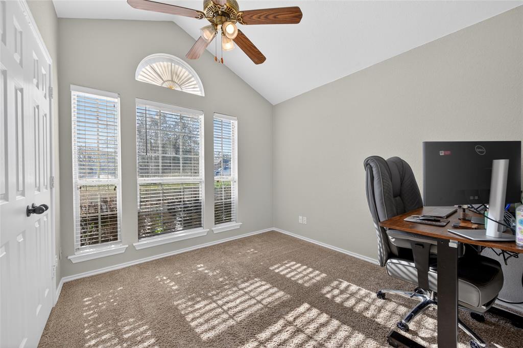 420 Robert Drive Springtown, TX 76082 - Photo 20 of 38 a view of a workspace with furniture and a window