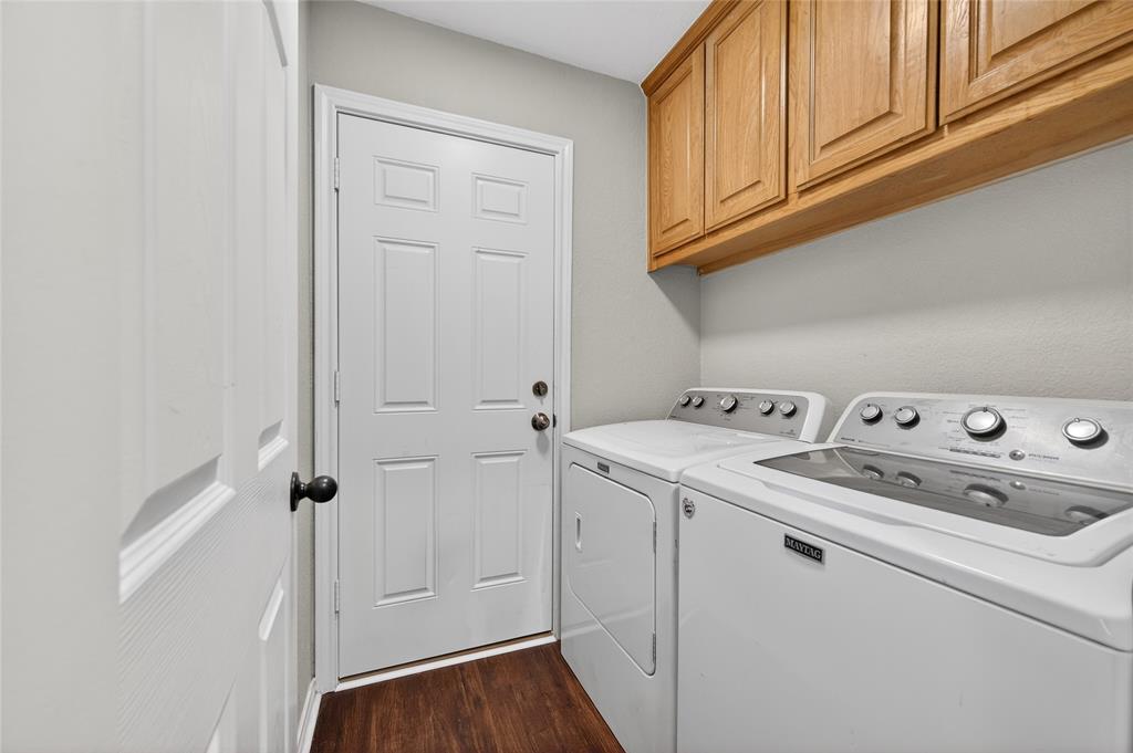 420 Robert Drive Springtown, TX 76082 - Photo 23 of 38 a view of utility room with washer and dryer