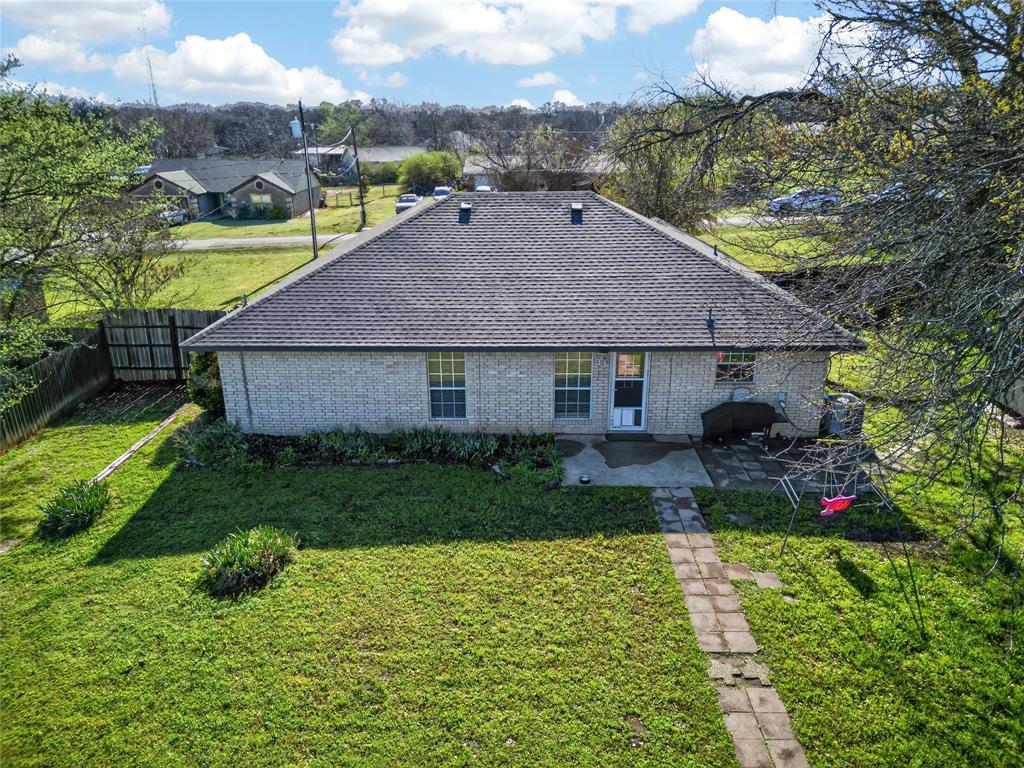 420 Robert Drive Springtown, TX 76082 - Photo 32 of 38 a aerial view of a house with garden