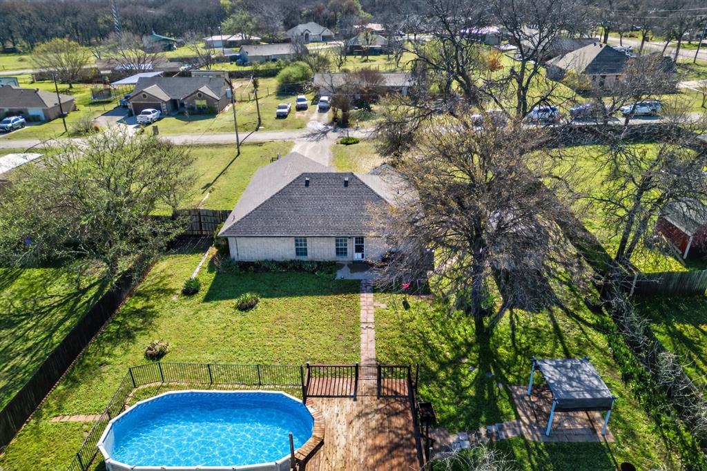 420 Robert Drive Springtown, TX 76082 - Photo 35 of 38 a view of houses with outdoor space