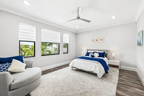 an aerial view of a house with a lake view