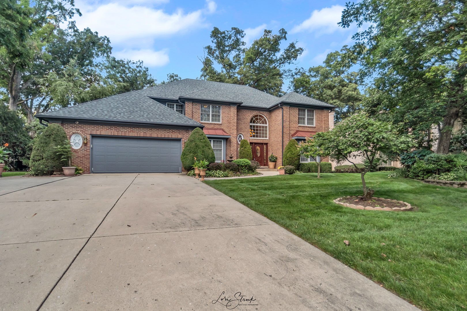 640 Ford Lane Bartlett, IL 60103 - Photo 11 of 46 a front view of a house with a yard