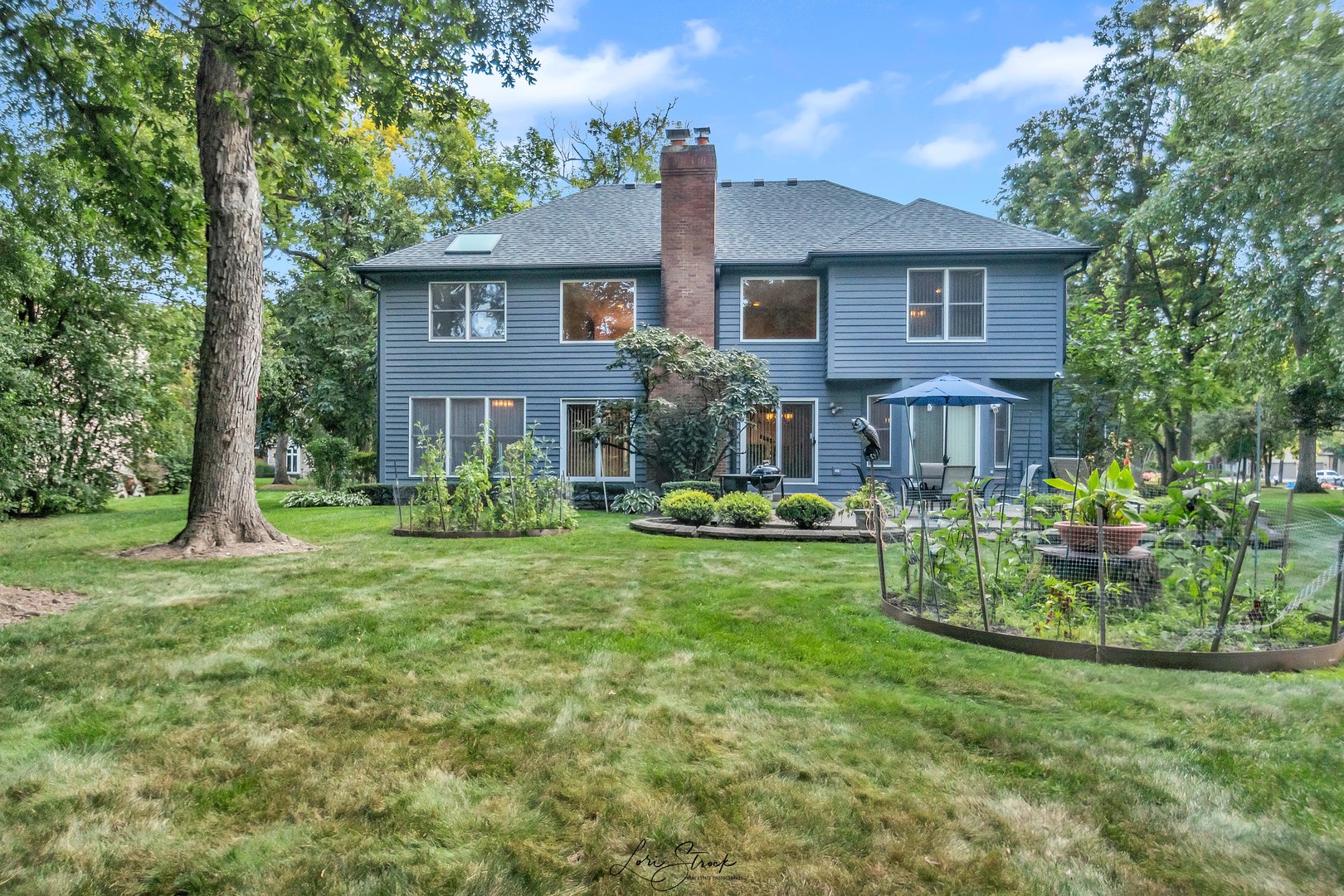 640 Ford Lane Bartlett, IL 60103 - Photo 18 of 46 a front view of a house with yard and green space