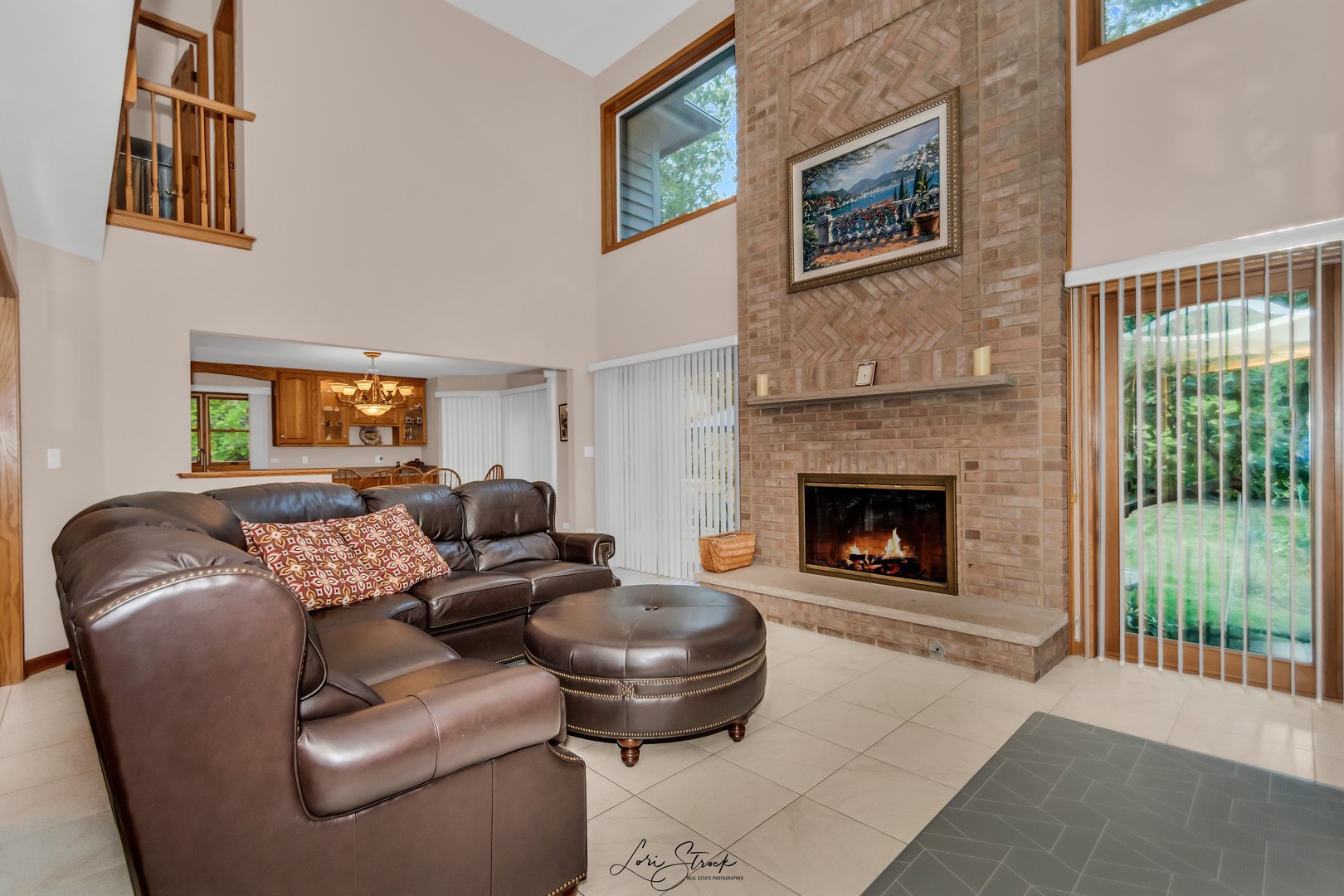 640 Ford Lane Bartlett, IL 60103 - Photo 24 of 46 a living room with furniture and a fireplace