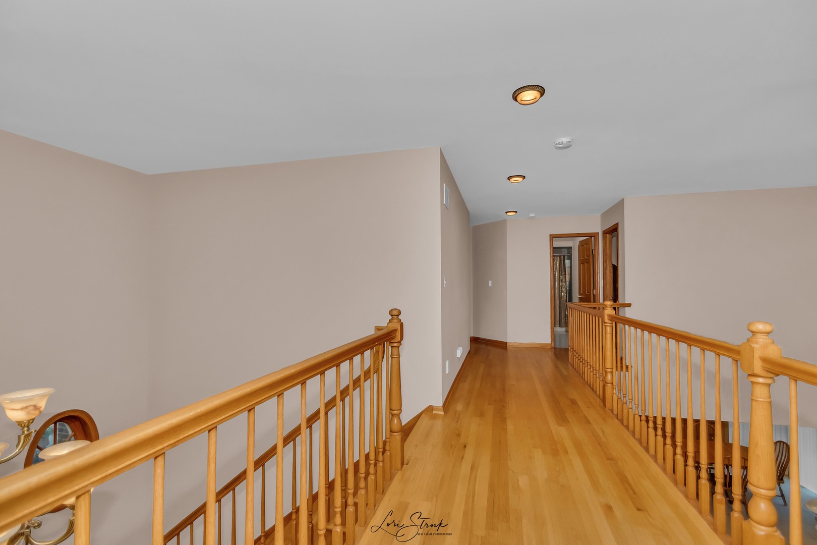 640 Ford Lane Bartlett, IL 60103 - Photo 35 of 46 a view of a hallway with wooden floor