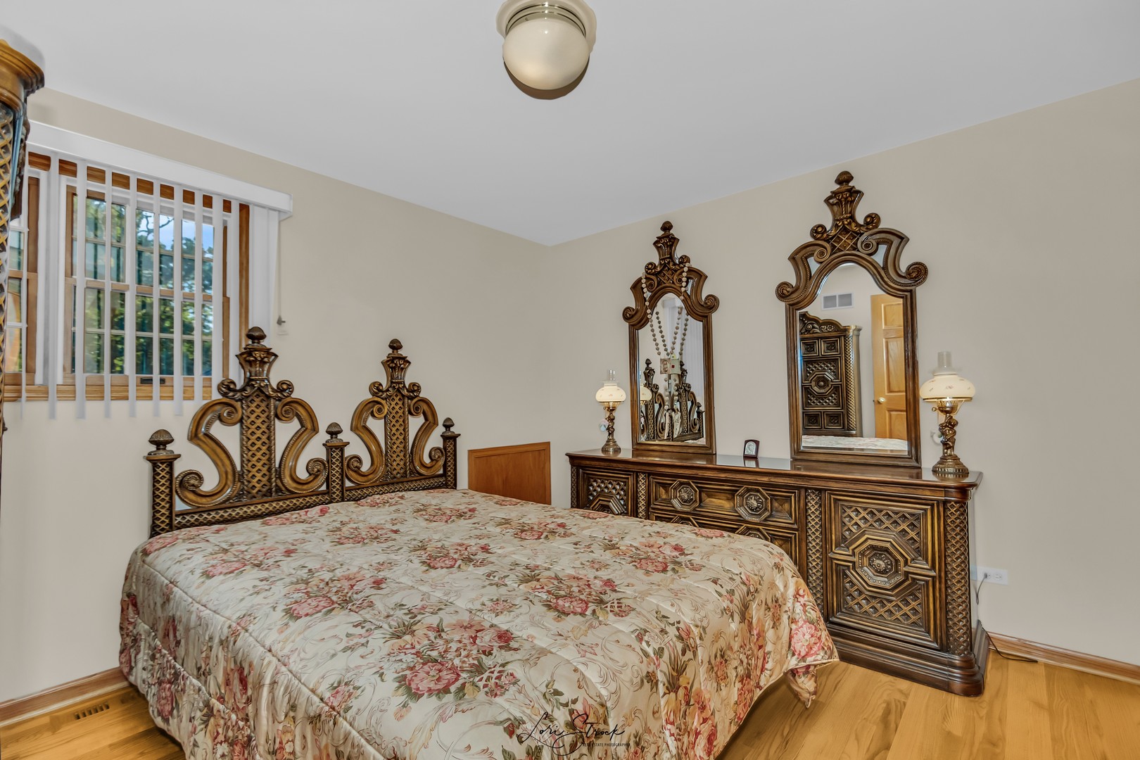 640 Ford Lane Bartlett, IL 60103 - Photo 40 of 46 a bedroom with a bed and a chandelier