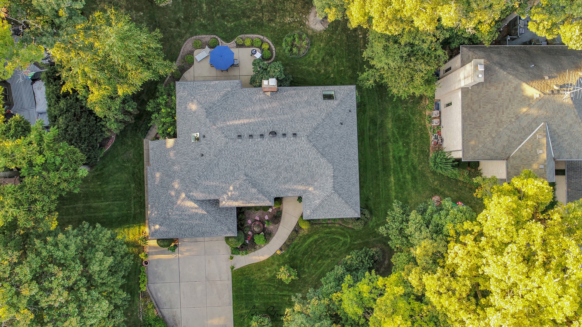640 Ford Lane Bartlett, IL 60103 - Photo 5 of 46 an aerial view of a house with a yard and a garage