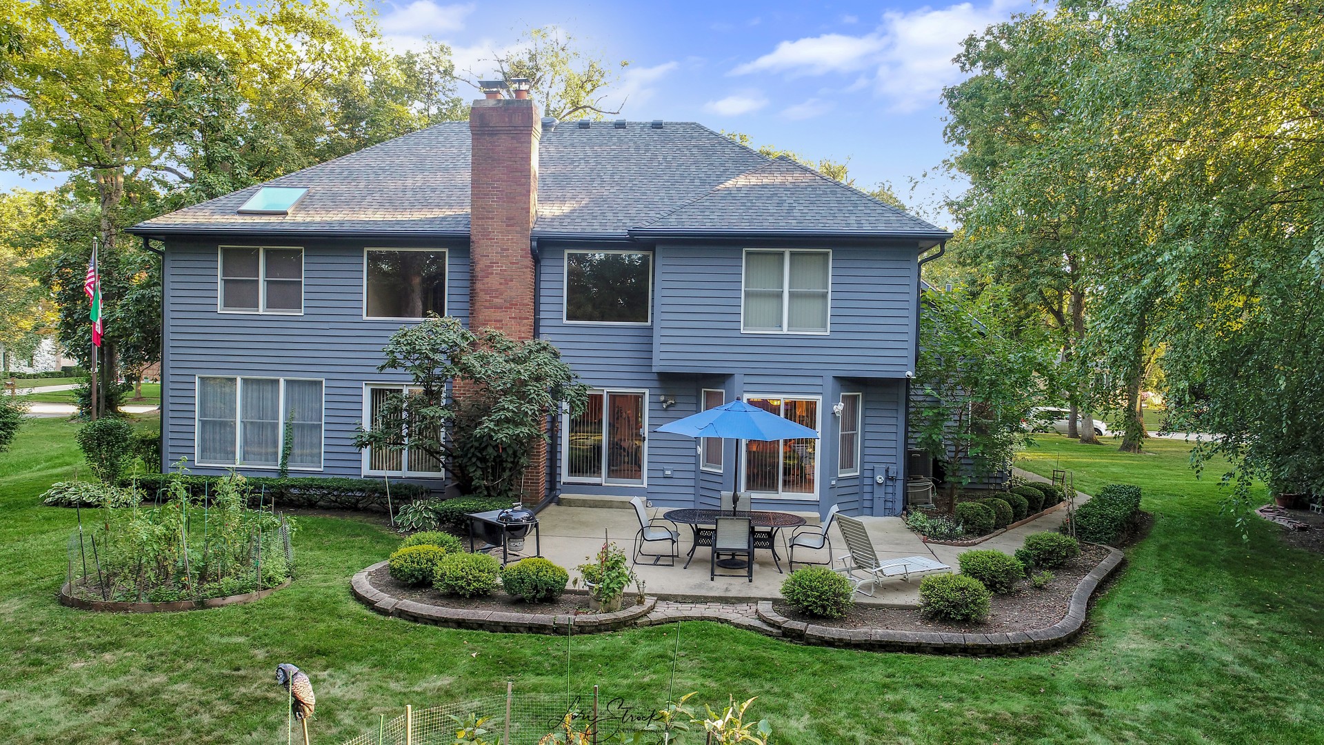 640 Ford Lane Bartlett, IL 60103 - Photo 10 of 46 a view of a house with a yard and plants