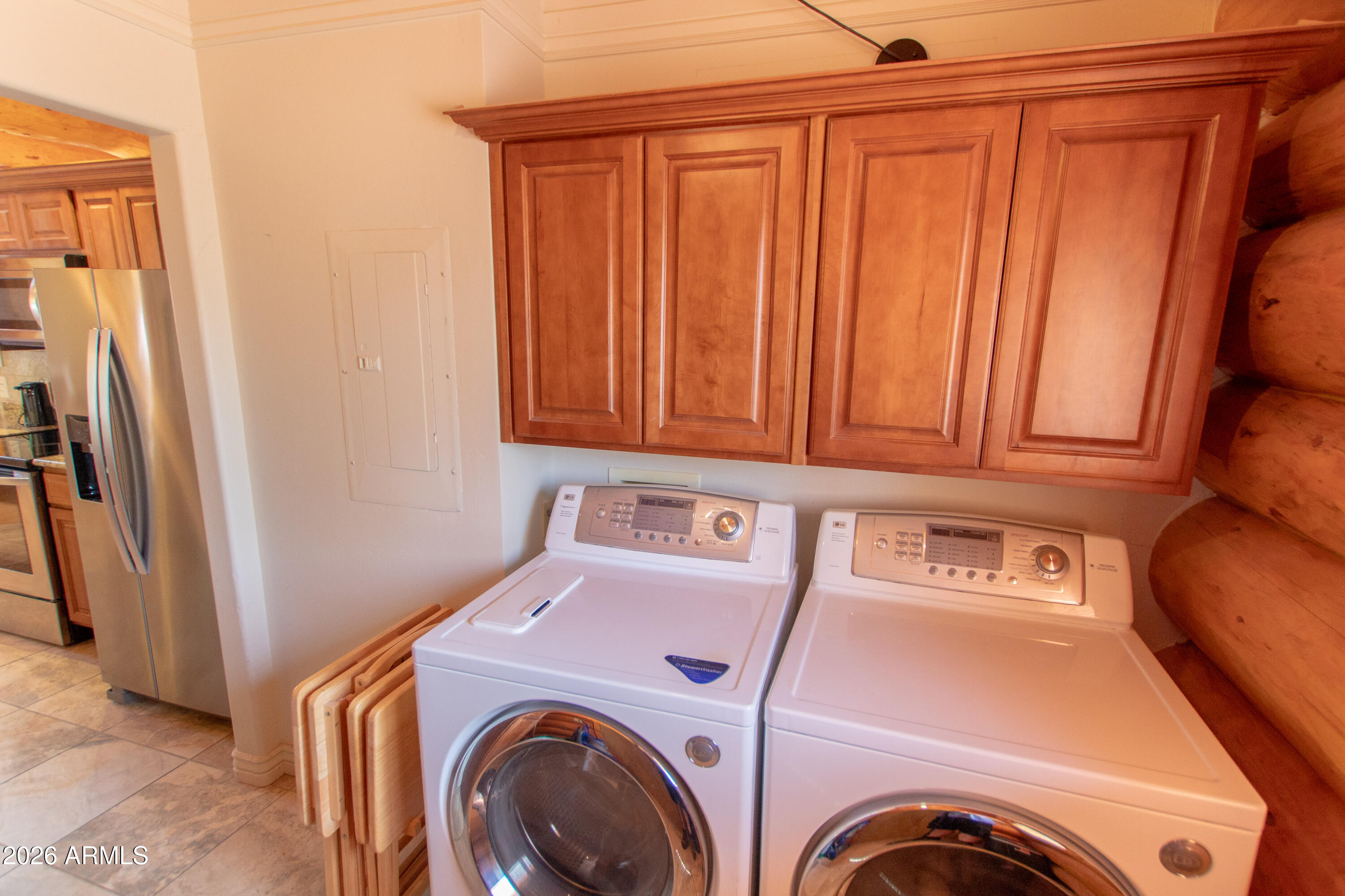 6168 Hidden Pines Loop Pine, AZ 85544 - Photo 12 of 25 a utility room with dryer and washer