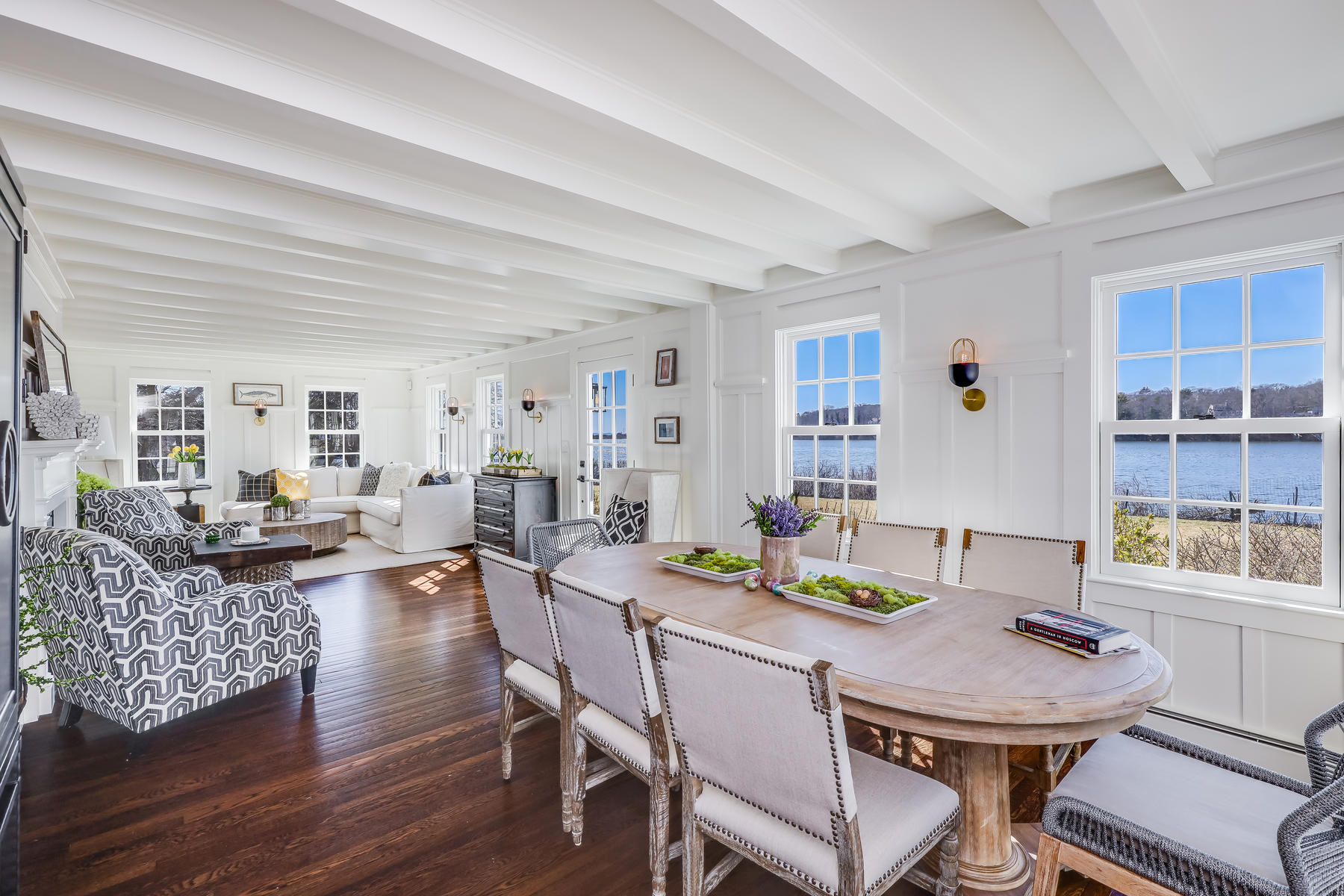 67 Quonset Road Falmouth, MA 02540 - Photo 11 of 55 a view of a dining room with furniture and wooden floor