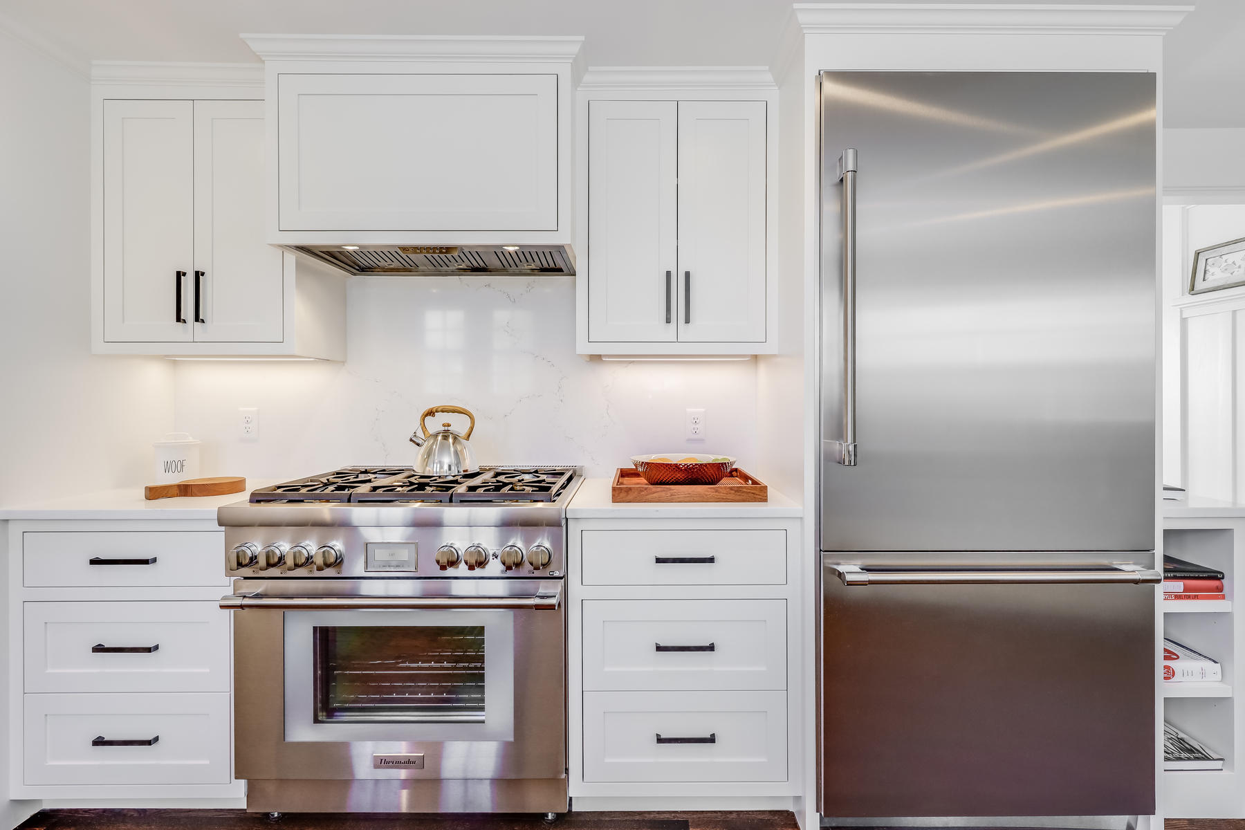 67 Quonset Road Falmouth, MA 02540 - Photo 18 of 55 a stove top oven sitting inside of a kitchen
