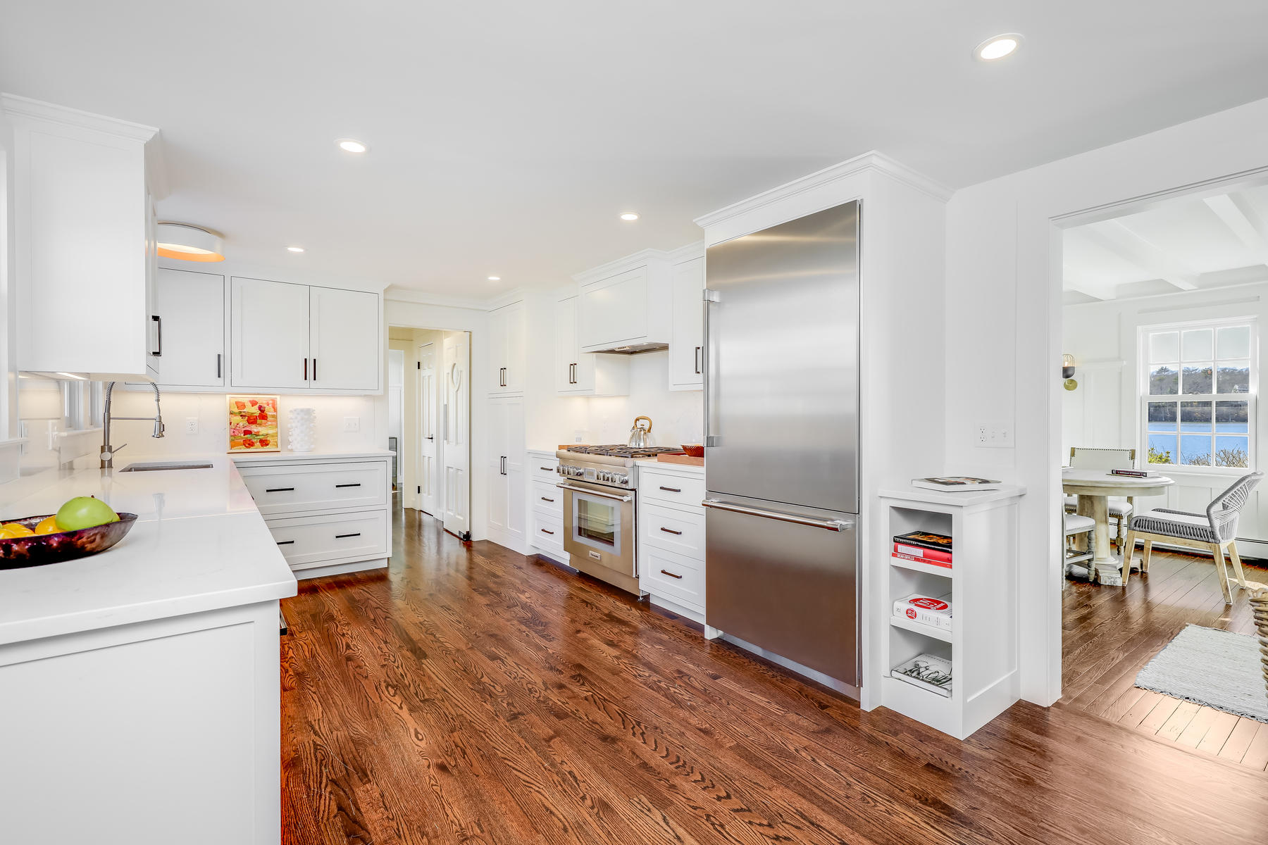 67 Quonset Road Falmouth, MA 02540 - Photo 21 of 55 a kitchen with stainless steel appliances a refrigerator sink and cabinets