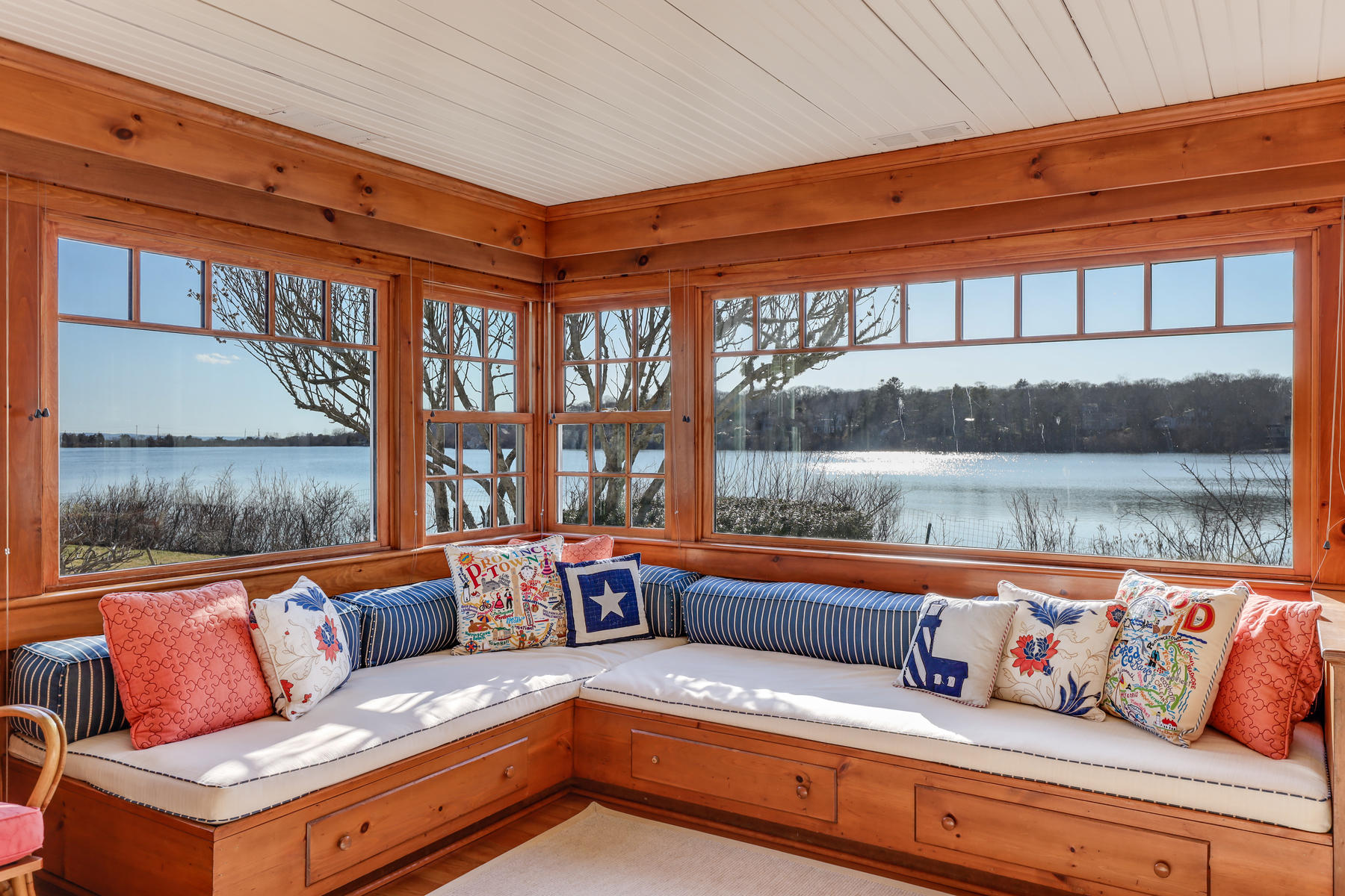 67 Quonset Road Falmouth, MA 02540 - Photo 26 of 55 a outdoor living room with furniture and a floor to ceiling window