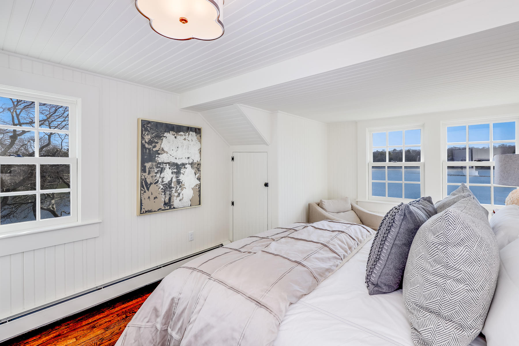 67 Quonset Road Falmouth, MA 02540 - Photo 33 of 55 a bedroom with a bed and a large window