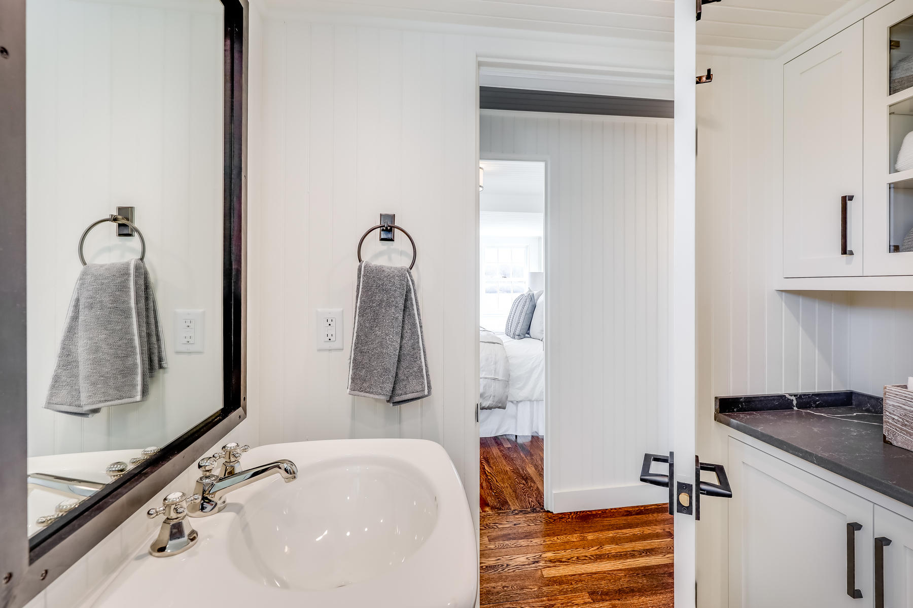 67 Quonset Road Falmouth, MA 02540 - Photo 34 of 55 a bathroom with a sink and mirror