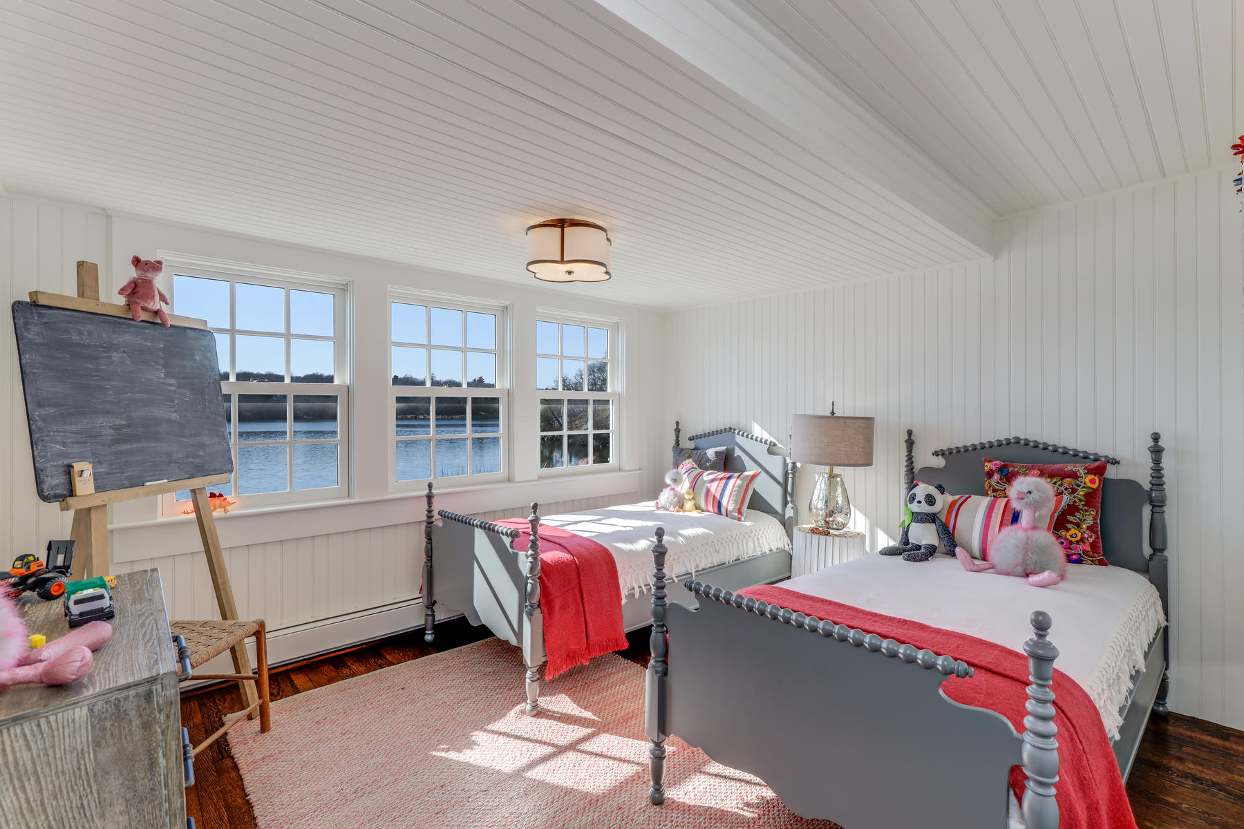 67 Quonset Road Falmouth, MA 02540 - Photo 35 of 55 a bed room with a bed and a chair