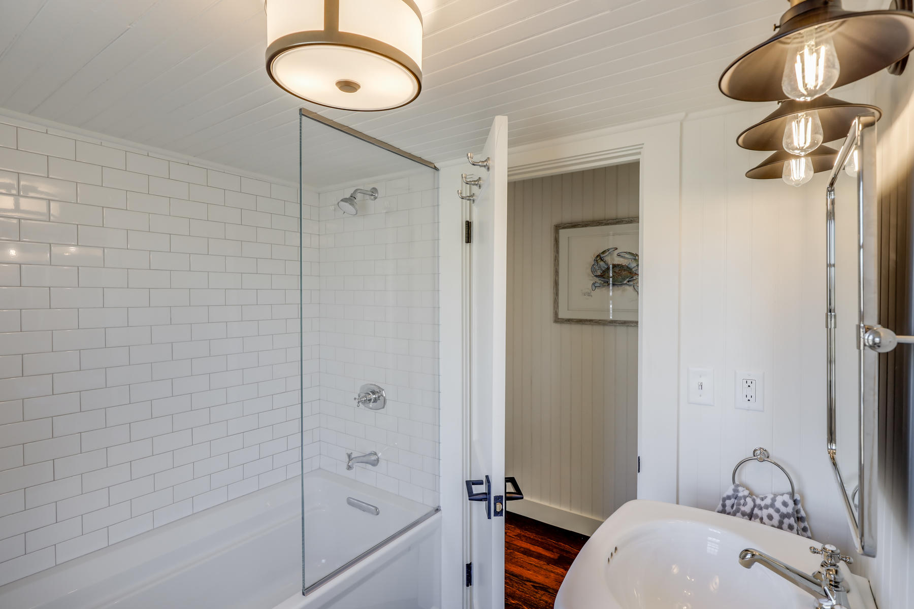 67 Quonset Road Falmouth, MA 02540 - Photo 37 of 55 a bathroom with a sink a toilet and shower