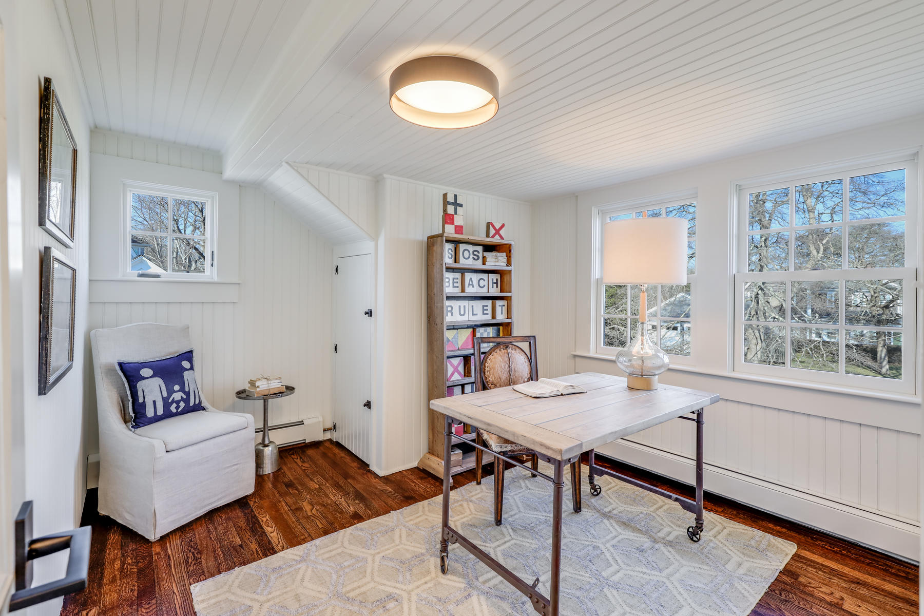 67 Quonset Road Falmouth, MA 02540 - Photo 38 of 55 a living room with furniture and a window