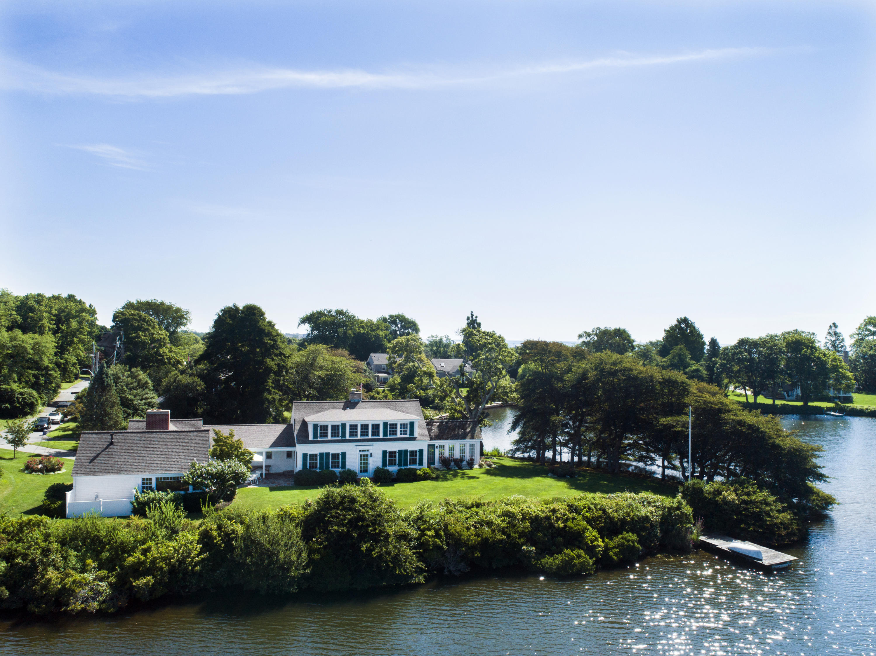 67 Quonset Road Falmouth, MA 02540 - Photo 48 of 55 a house with garden in front of it