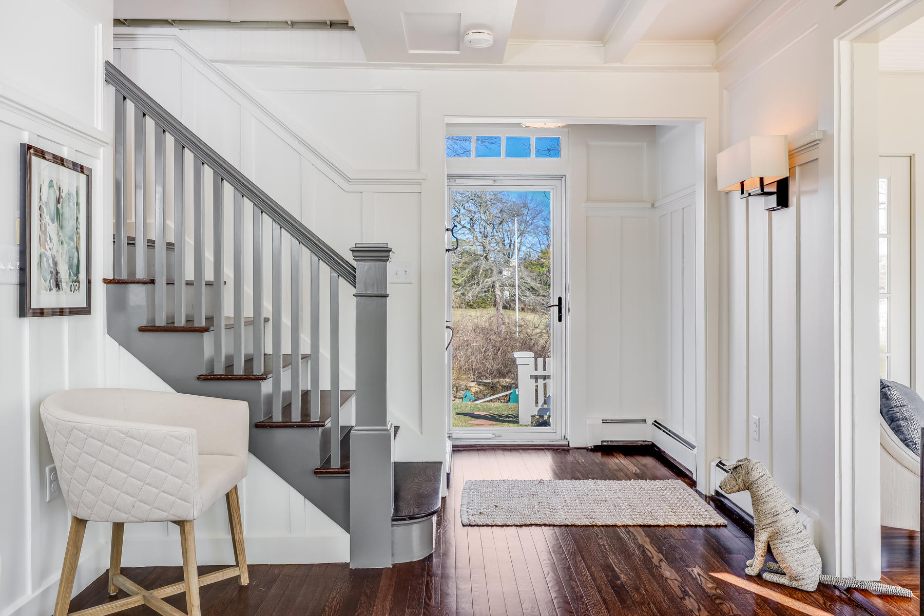 67 Quonset Road Falmouth, MA 02540 - Photo 5 of 55 a view of front door with wooden floor and stairs