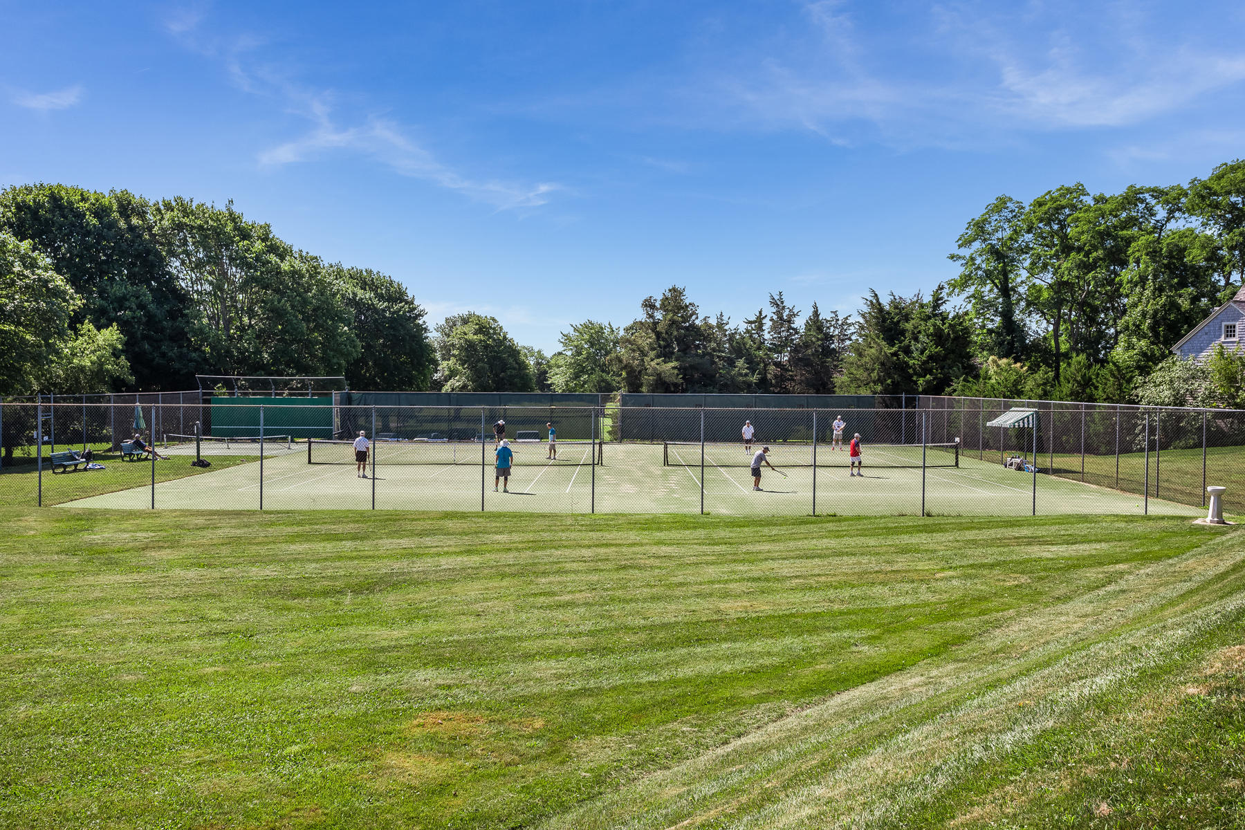 67 Quonset Road Falmouth, MA 02540 - Photo 54 of 55 a white swimming pool with a trees in the background