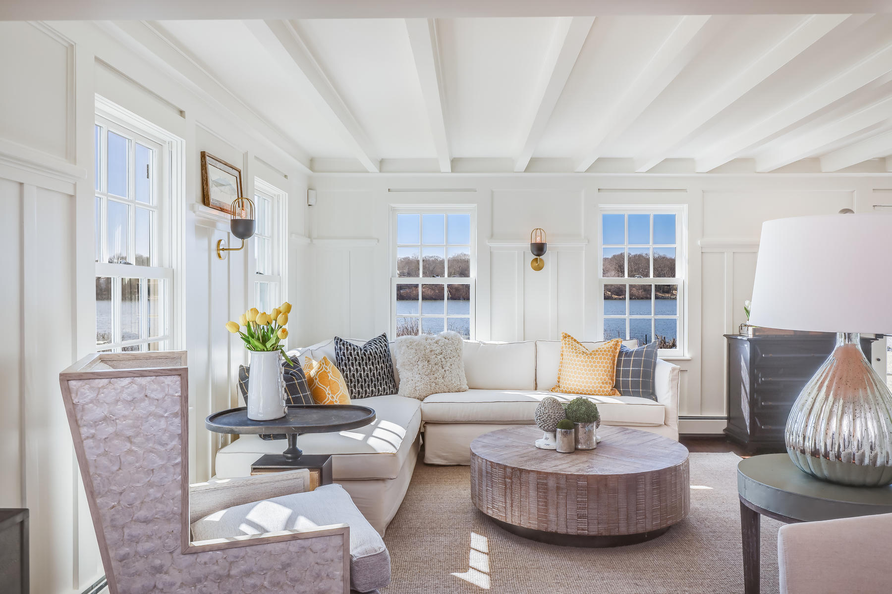 67 Quonset Road Falmouth, MA 02540 - Photo 6 of 55 a living room with furniture and a potted plant