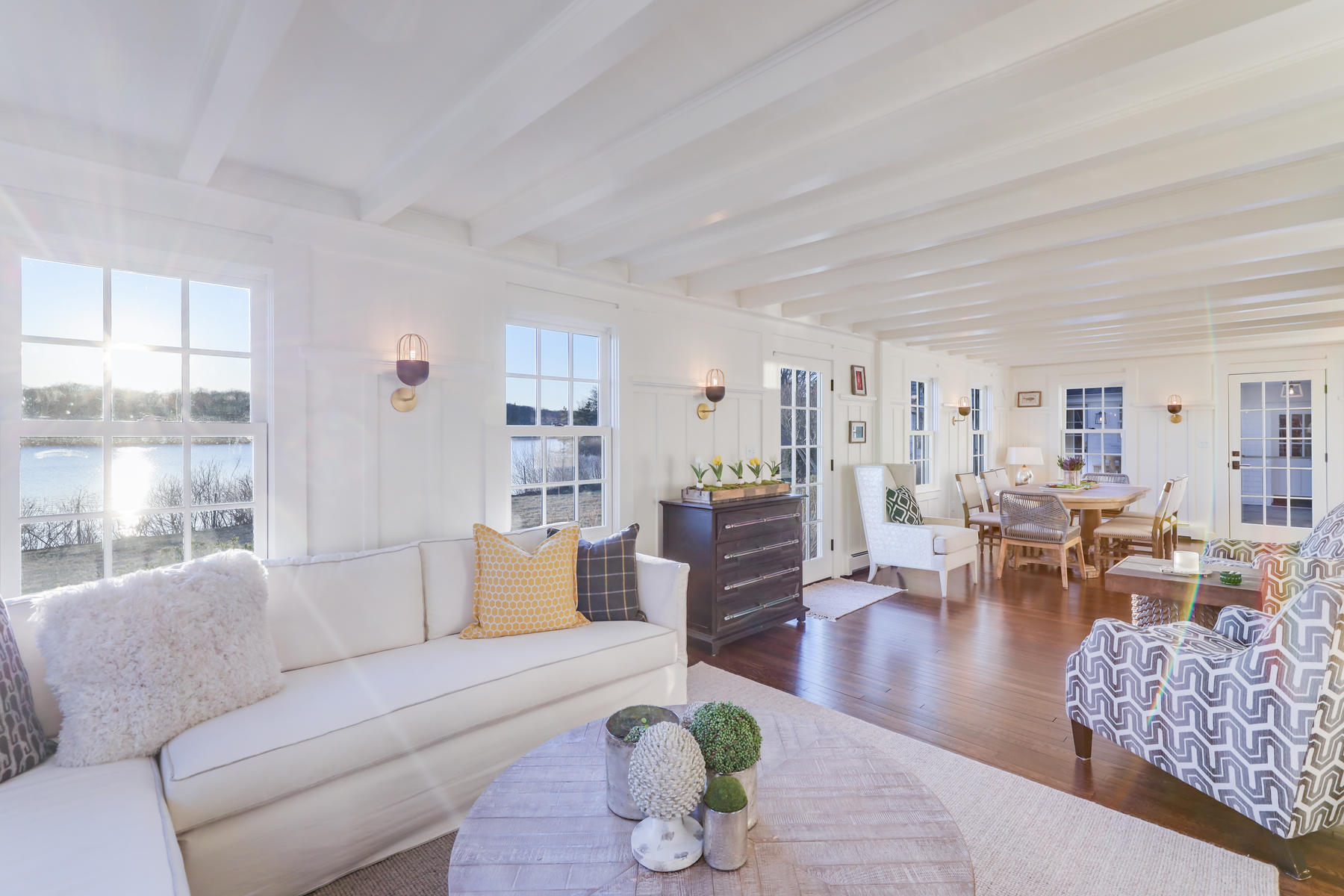 67 Quonset Road Falmouth, MA 02540 - Photo 7 of 55 a living room with furniture and a large window