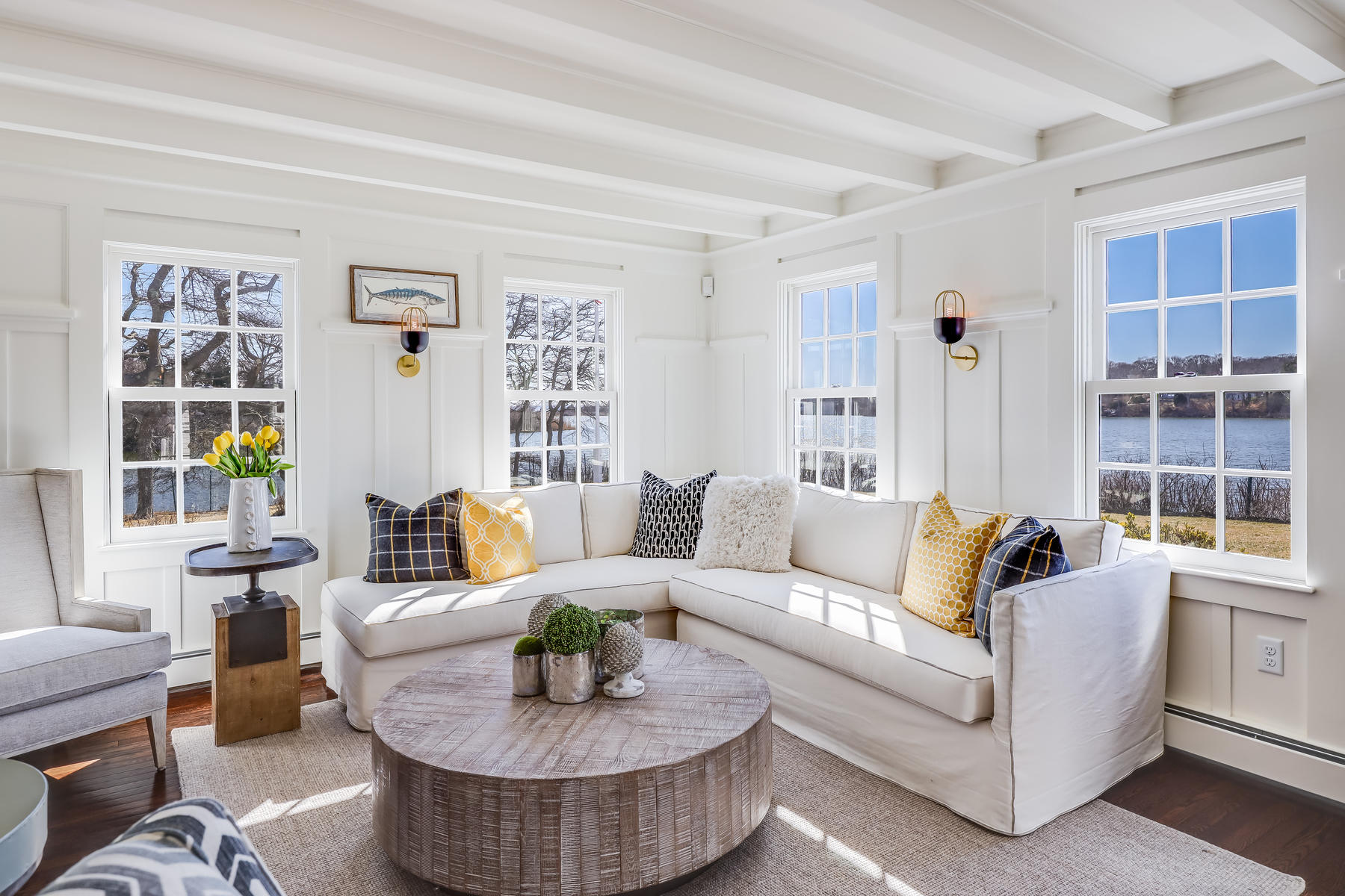 67 Quonset Road Falmouth, MA 02540 - Photo 8 of 55 a living room with furniture and a large window